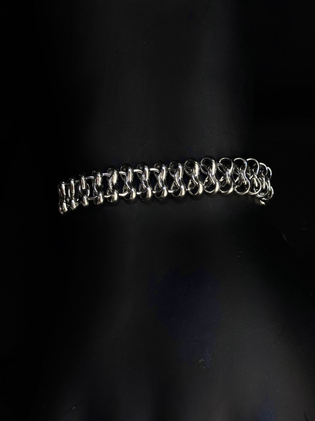 Snake steel chain bracelet on black